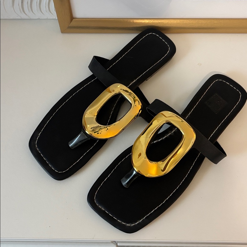Black Sandals with Gold Accents